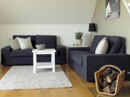 Strandnahes Ostsee-Ferienhaus Det Lille Strandhus mit Meerblick WLAN und Kamin